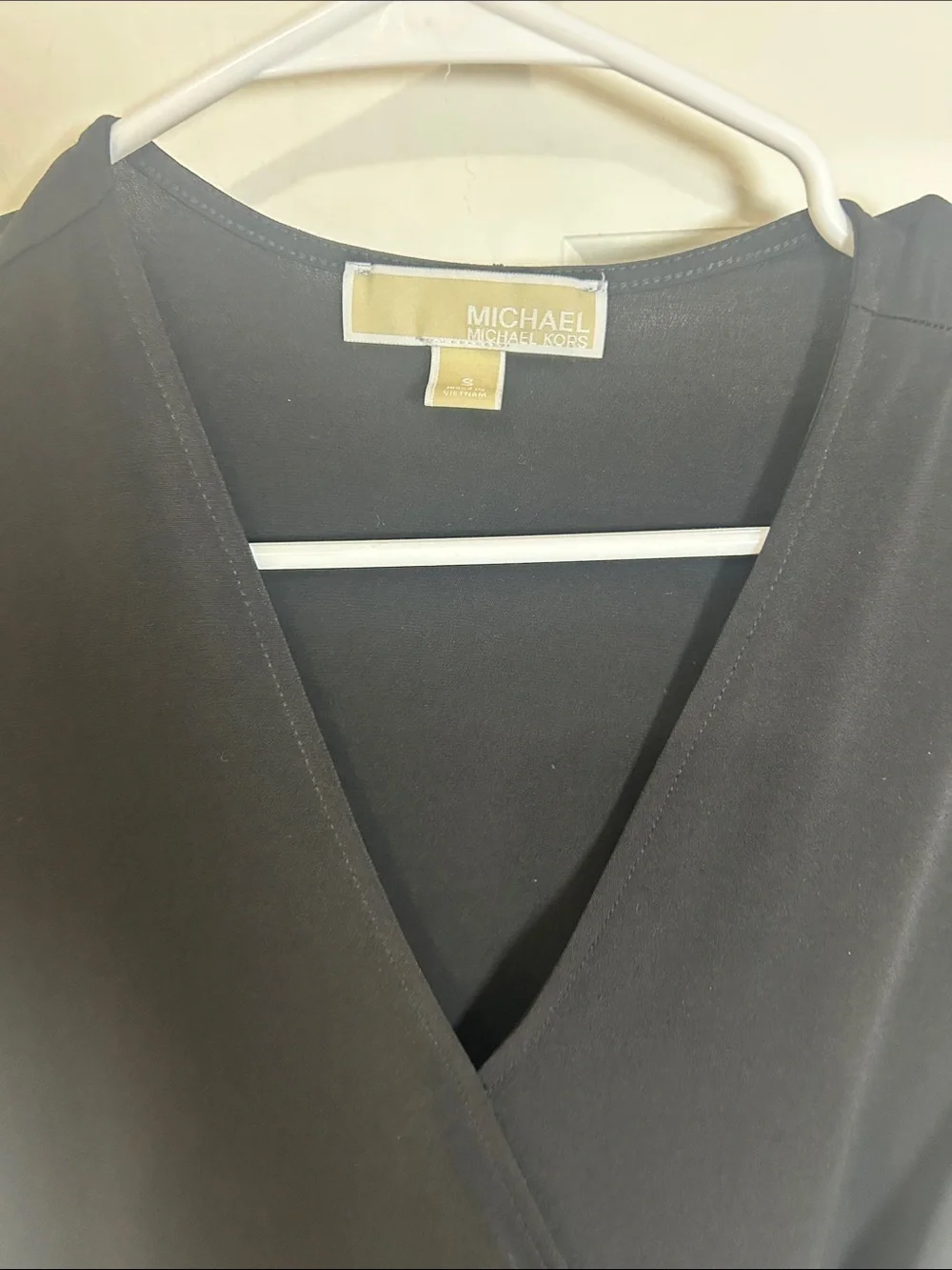 Michael Kors women’s short sleeve wrapped dress size small black with gold ring